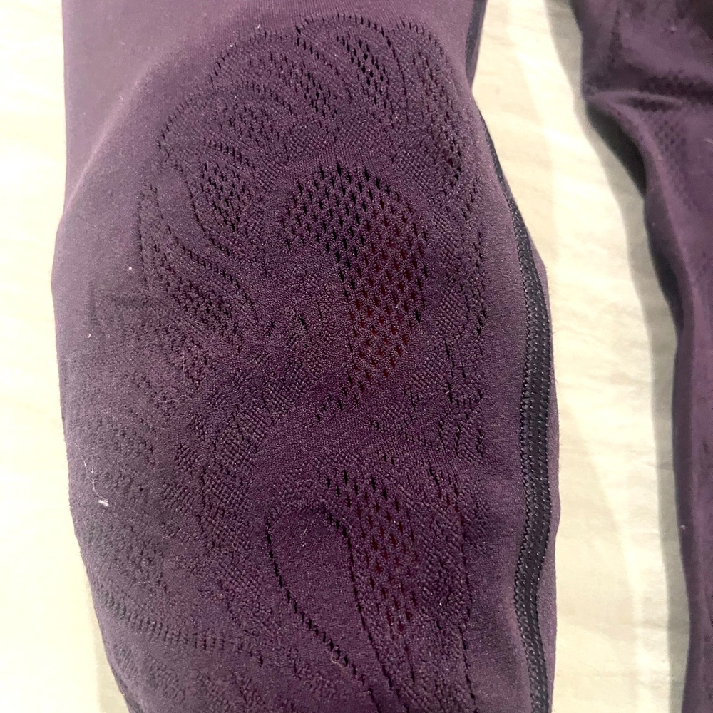 Lululemon size 2 high waist plum leggings with cutouts